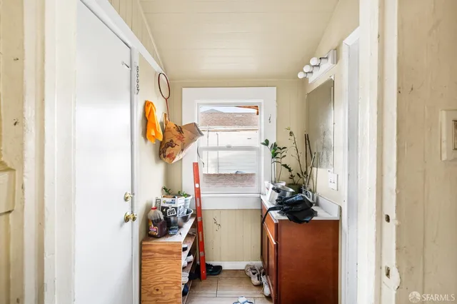 a workspace with furniture and window