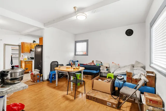 a bathroom with a sink mirror vanity and toilet