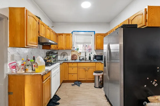 a view of a house with a door and a window