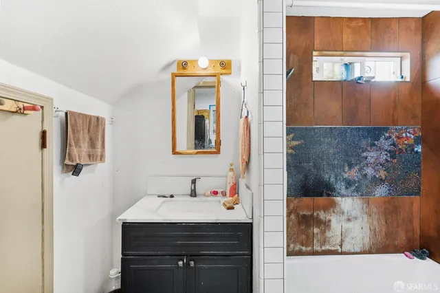 an aerial view of residential building and parking space