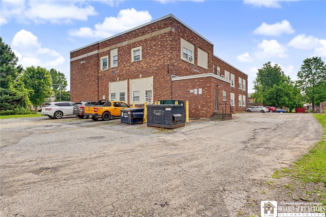 305 North Work Street Ellicott, NY 14733 - Photo 6 of 45 back side view from parking lot.