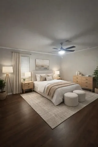 a bedroom with a large bed and a night stand