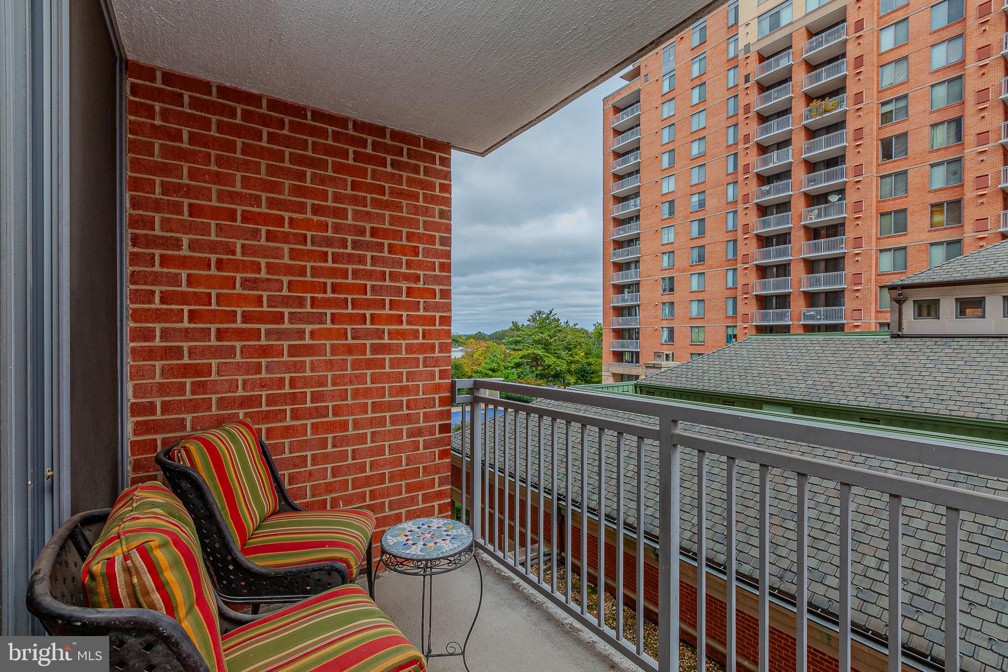 11710 Old Georgetown Road, Unit 422 North Bethesda, MD 20852 - Photo 19 of 28 a view of a balcony with a chair