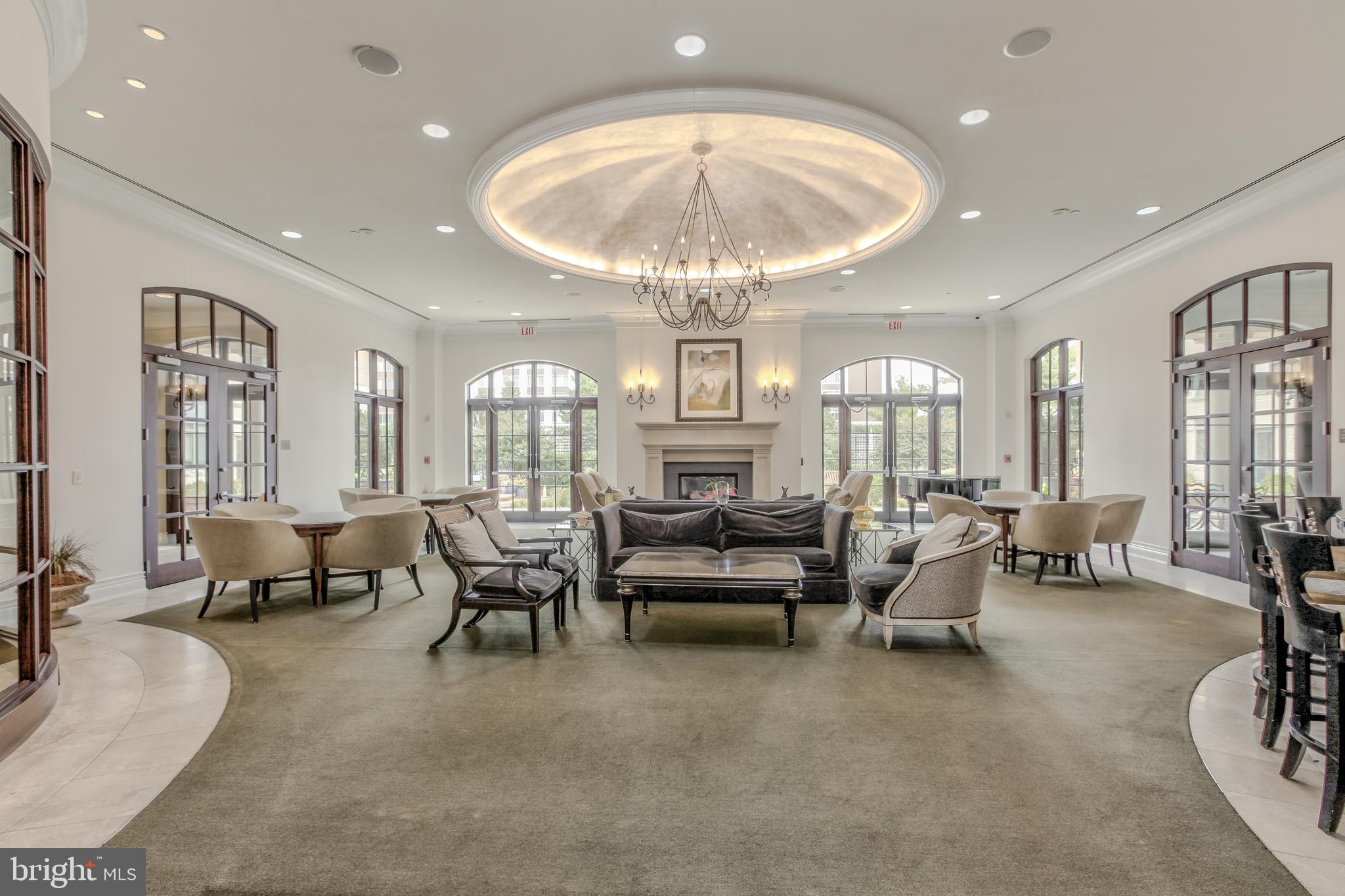 11710 Old Georgetown Road, Unit 422 North Bethesda, MD 20852 - Photo 22 of 28 a living room with furniture and a large window
