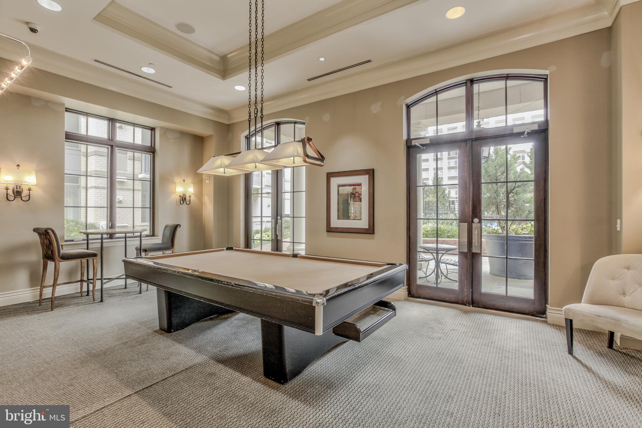 11710 Old Georgetown Road, Unit 422 North Bethesda, MD 20852 - Photo 24 of 28 a room with pool table and windows