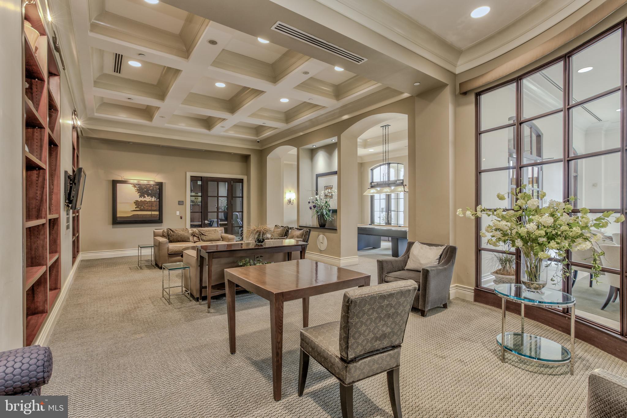 11710 Old Georgetown Road, Unit 422 North Bethesda, MD 20852 - Photo 25 of 28 a view of a livingroom with furniture and a potted plant