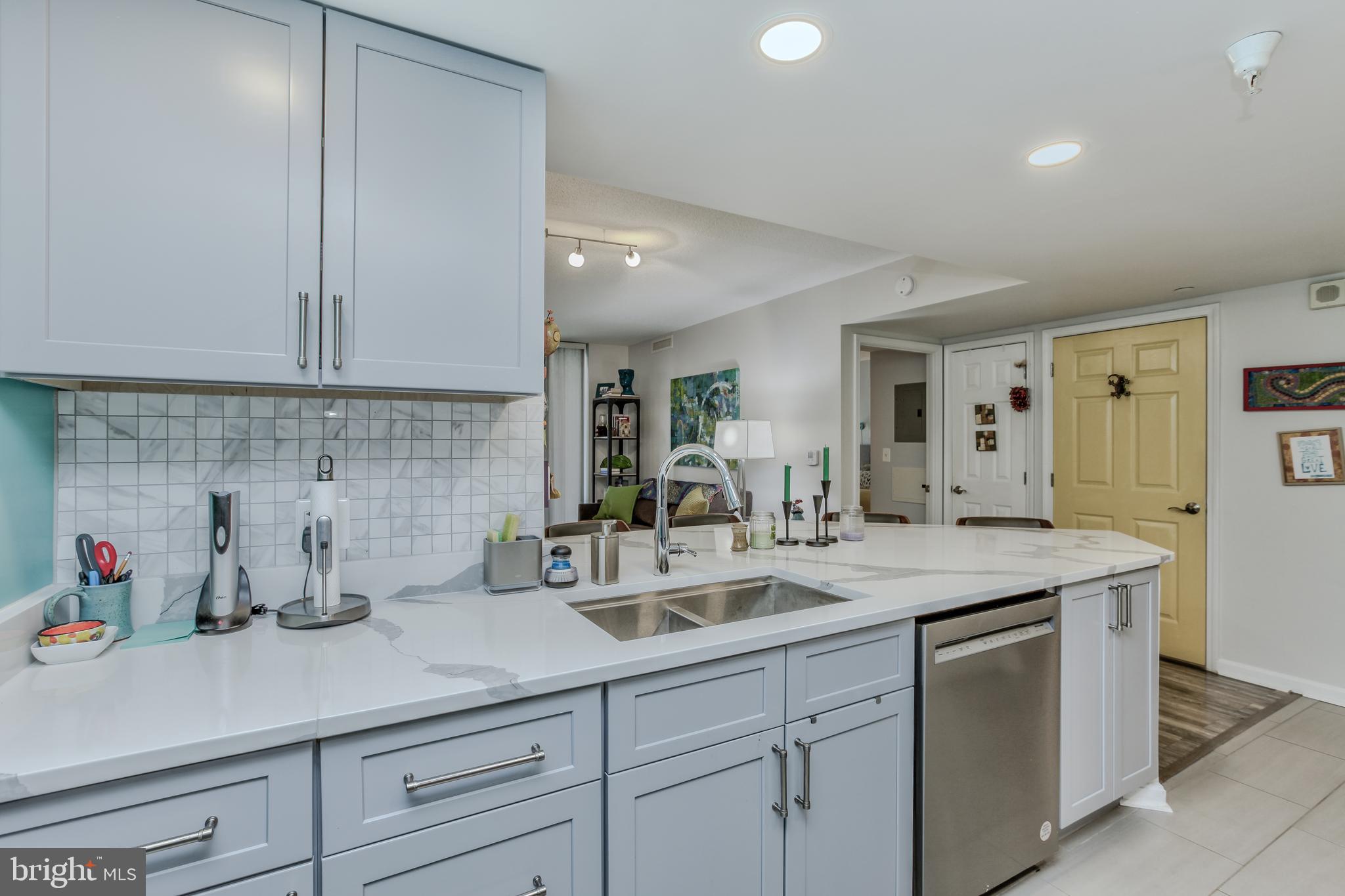 11710 Old Georgetown Road, Unit 422 North Bethesda, MD 20852 - Photo 8 of 28 a kitchen with a sink and cabinets