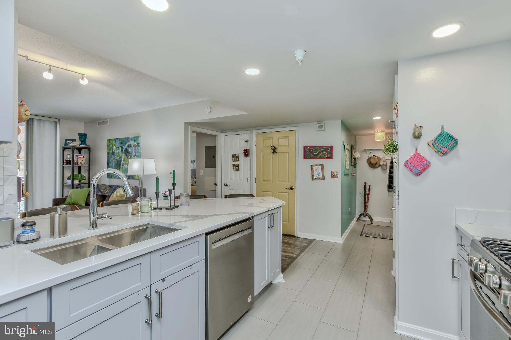 11710 Old Georgetown Road, Unit 422 North Bethesda, MD 20852 - Photo 9 of 28 a spacious bathroom with a sink double vanity granite and a shower
