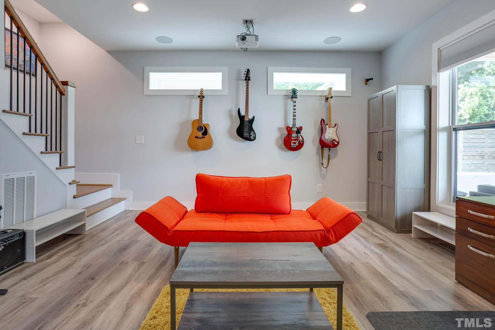 1702 Bickett Boulevard Raleigh, NC 27608 - Photo 29 of 41 a room with furniture and wooden floor