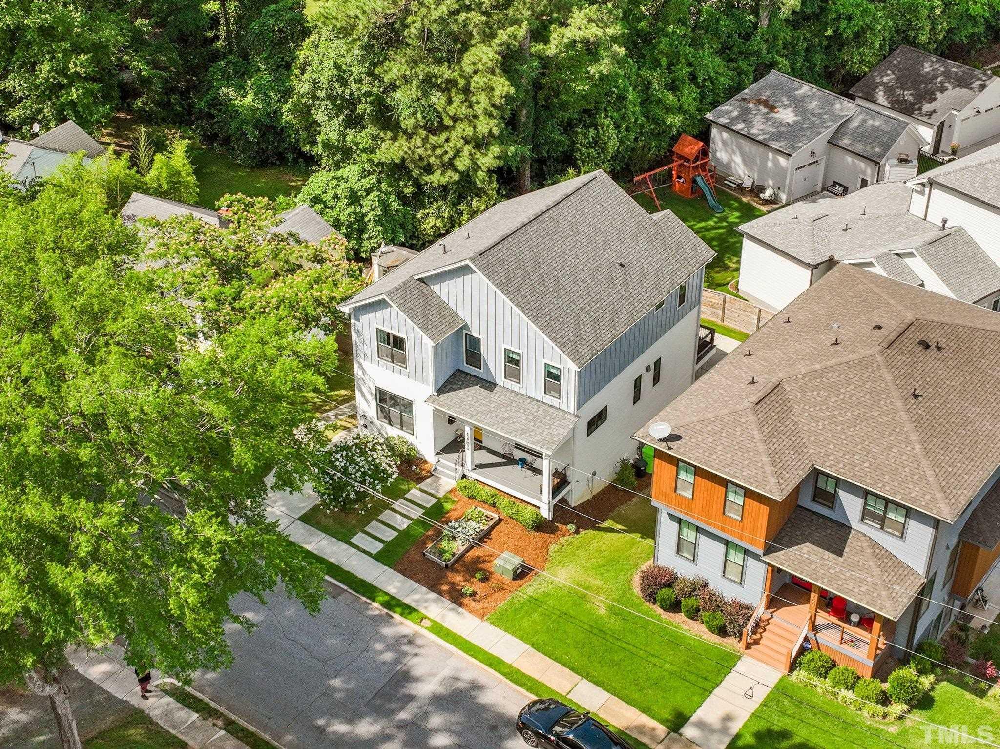 1702 Bickett Boulevard Raleigh, NC 27608 - Photo 3 of 41 an aerial view of a house with a garden
