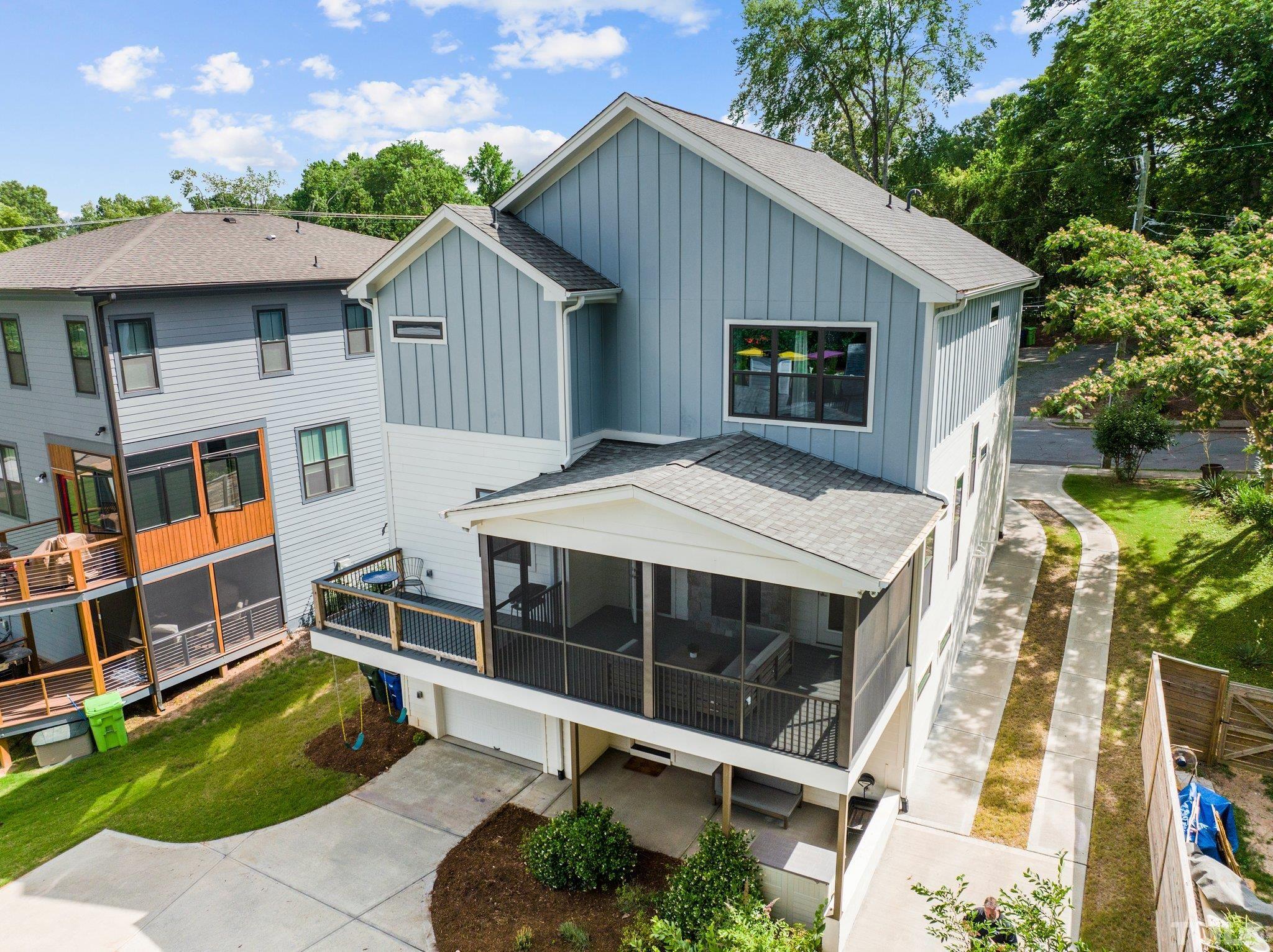 1702 Bickett Boulevard Raleigh, NC 27608 - Photo 36 of 41 a view of house with yard and outdoor seating