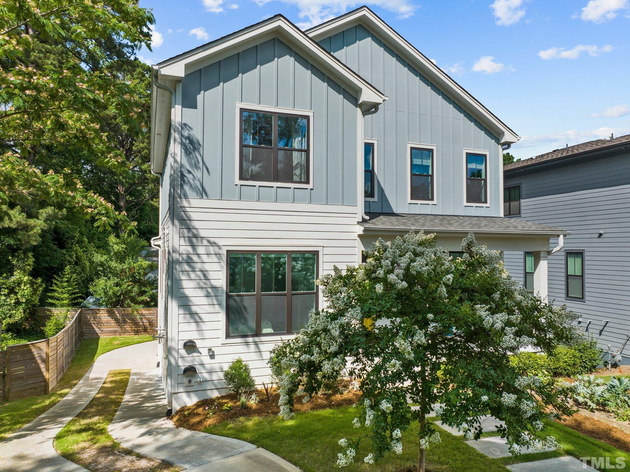 1702 Bickett Boulevard Raleigh, NC 27608 - Photo 40 of 41 a front view of a house with a yard