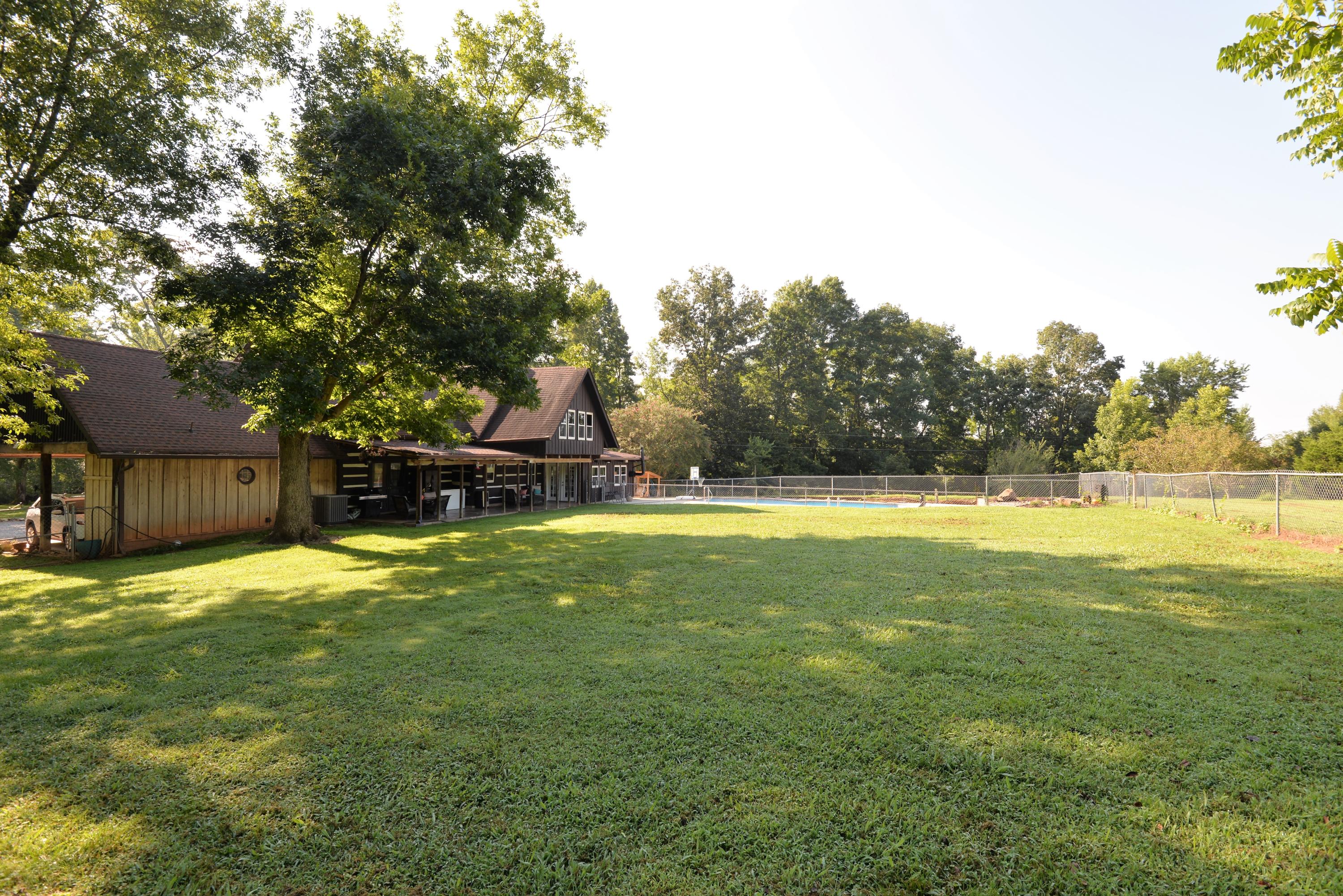 46 Blue Hole Road LaFayette, GA 30728 - Photo 2 of 60 Back yard and pool from right