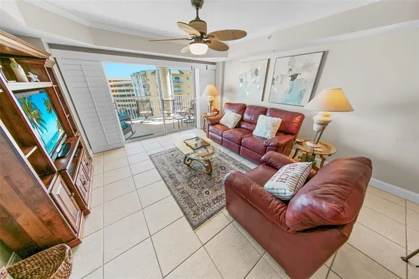 a living room with furniture and a window
