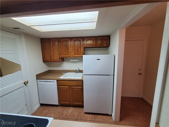 a bathroom with a sink and toilet