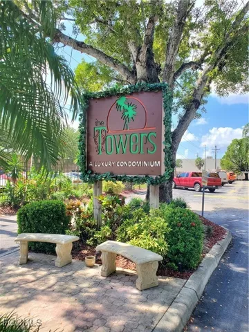 a view of a garden with a fountain