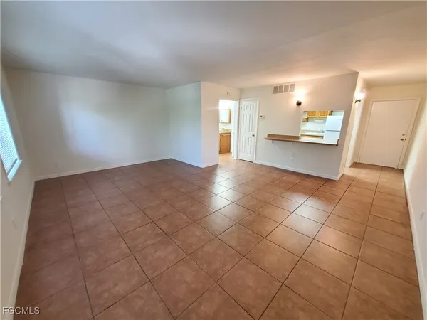 a view of a livingroom and a window