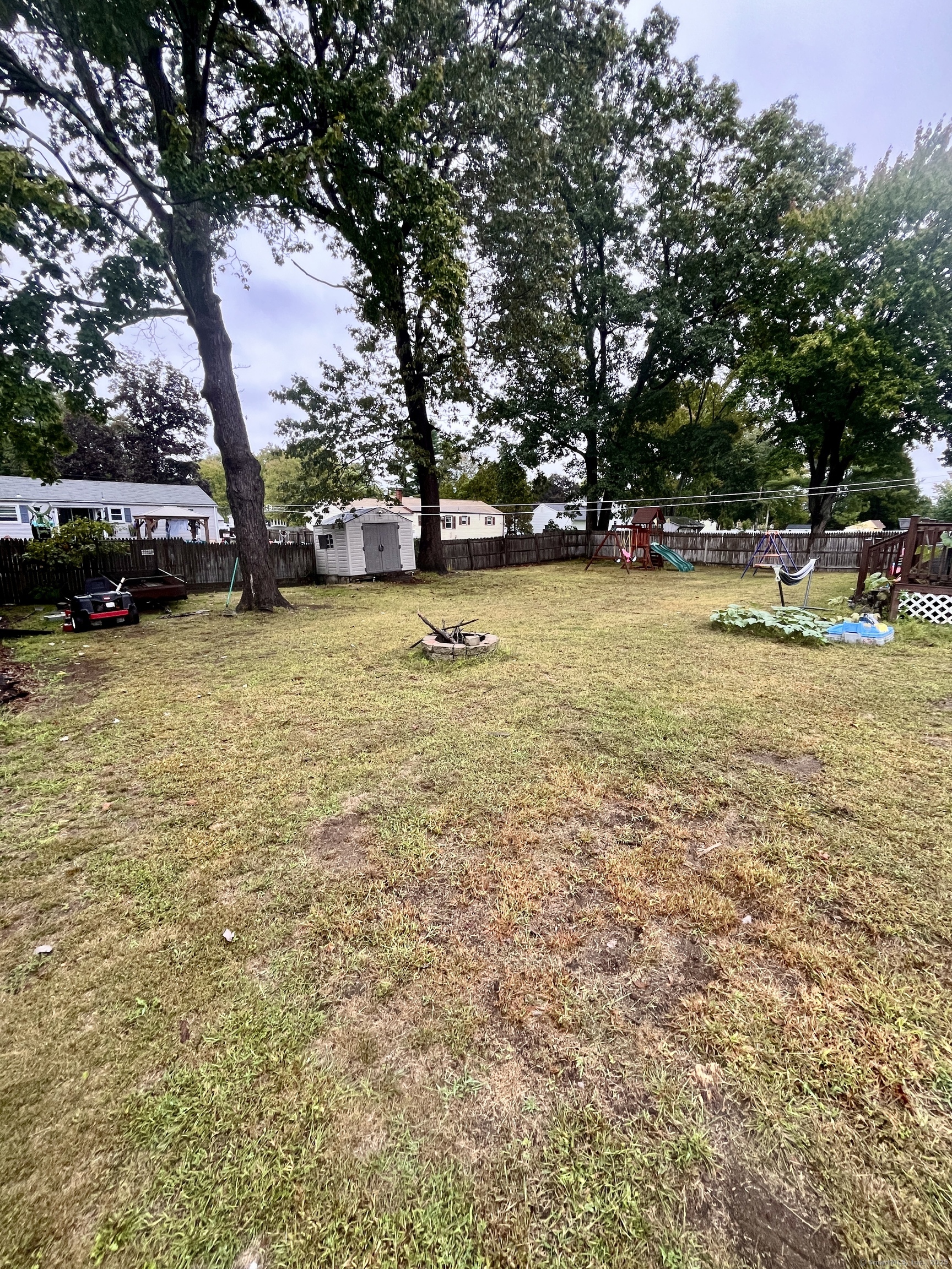 12 Post Road Enfield, CT 06082 - Photo 15 of 15 a view of yard with swimming pool and trees