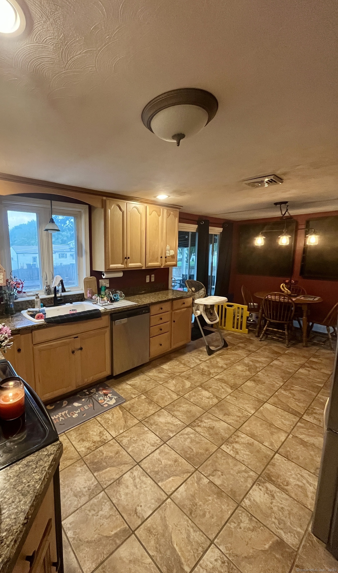 12 Post Road Enfield, CT 06082 - Photo 6 of 15 a large kitchen with stainless steel appliances kitchen island granite countertop a sink and cabinets