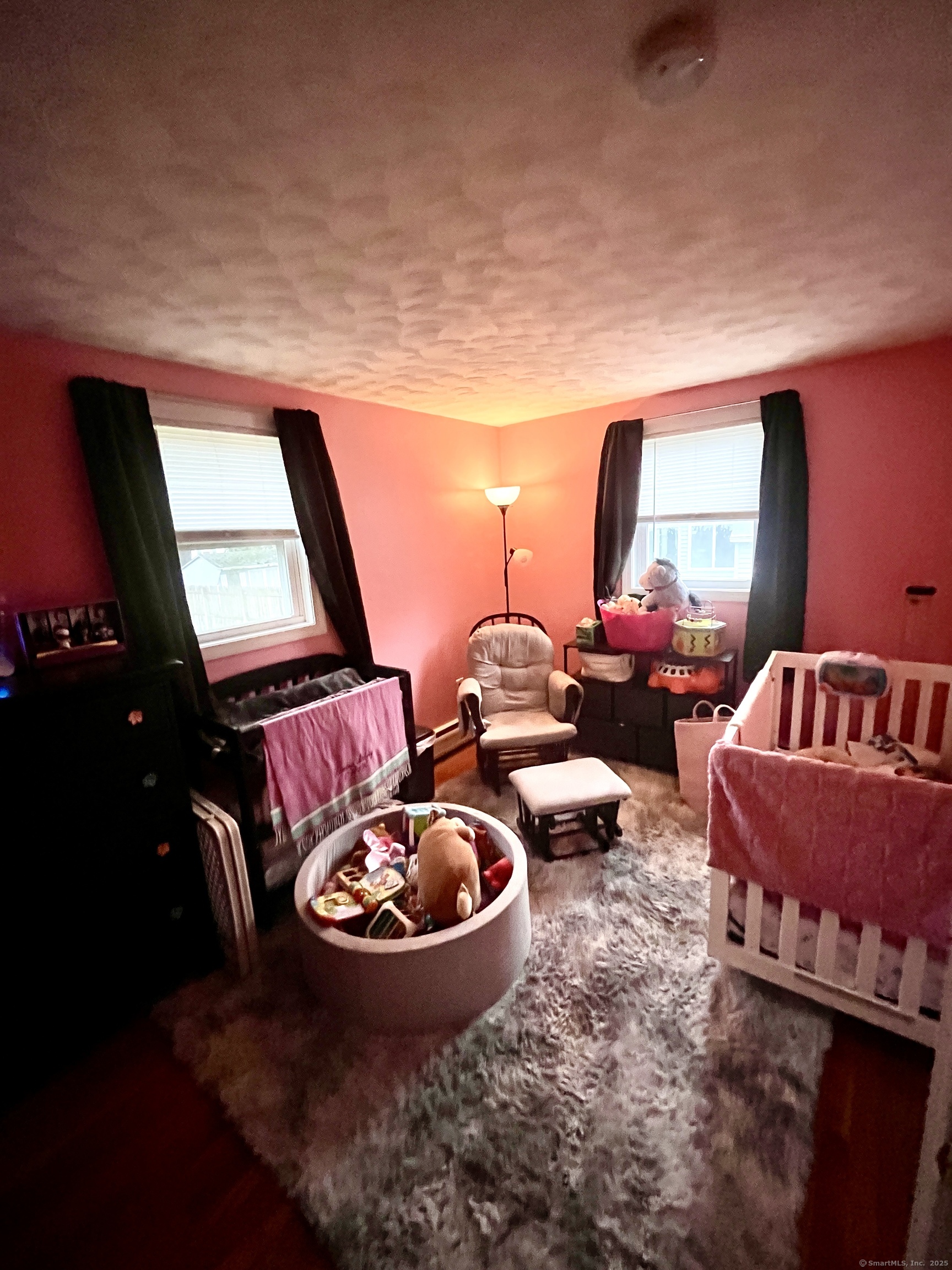 12 Post Road Enfield, CT 06082 - Photo 9 of 15 a living room with furniture and a potted plant