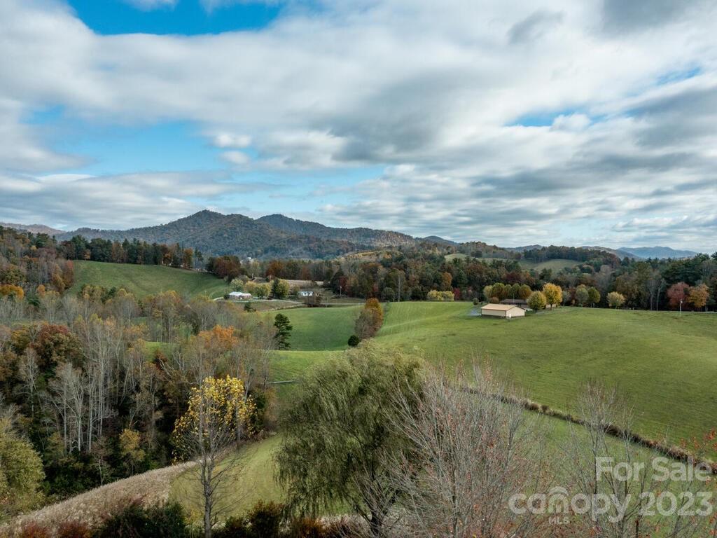 264 Hazel Brook Road Marshall, NC 28753 - Photo 15 of 47 a view of a lake with houses