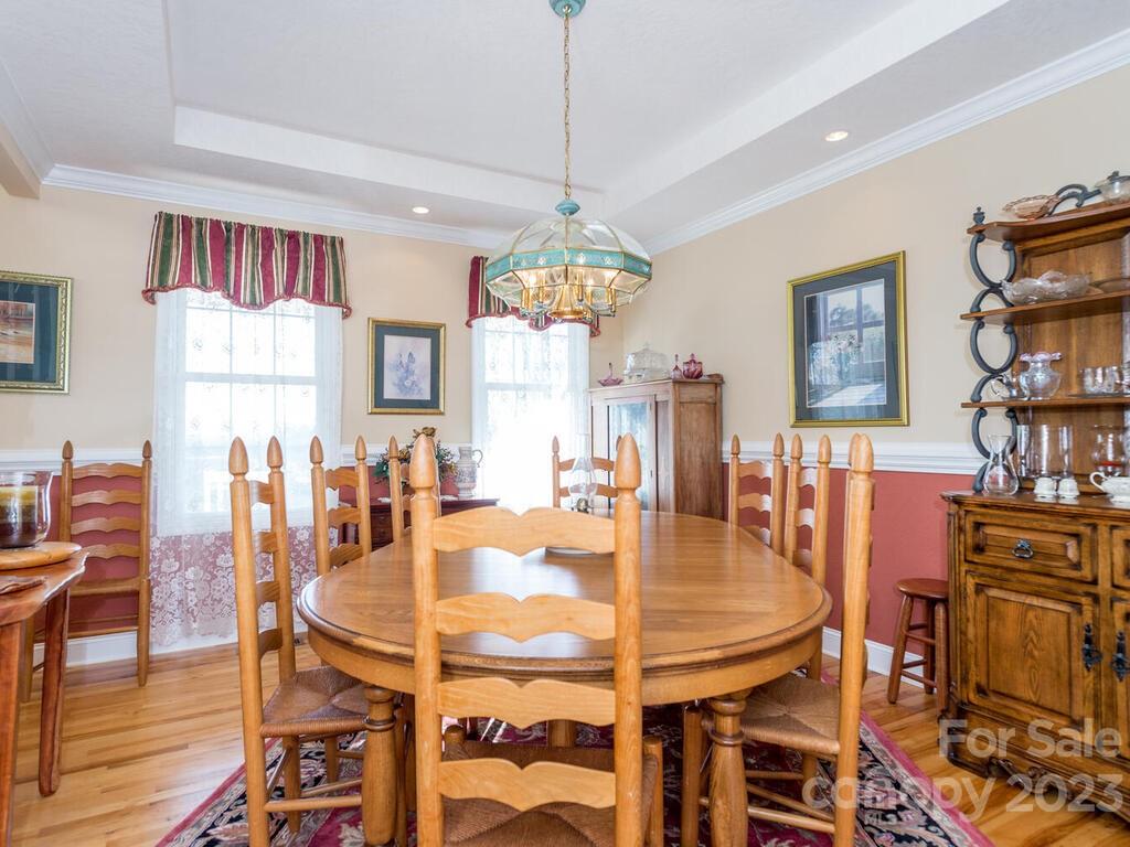 264 Hazel Brook Road Marshall, NC 28753 - Photo 20 of 47 a dining room with furniture and window