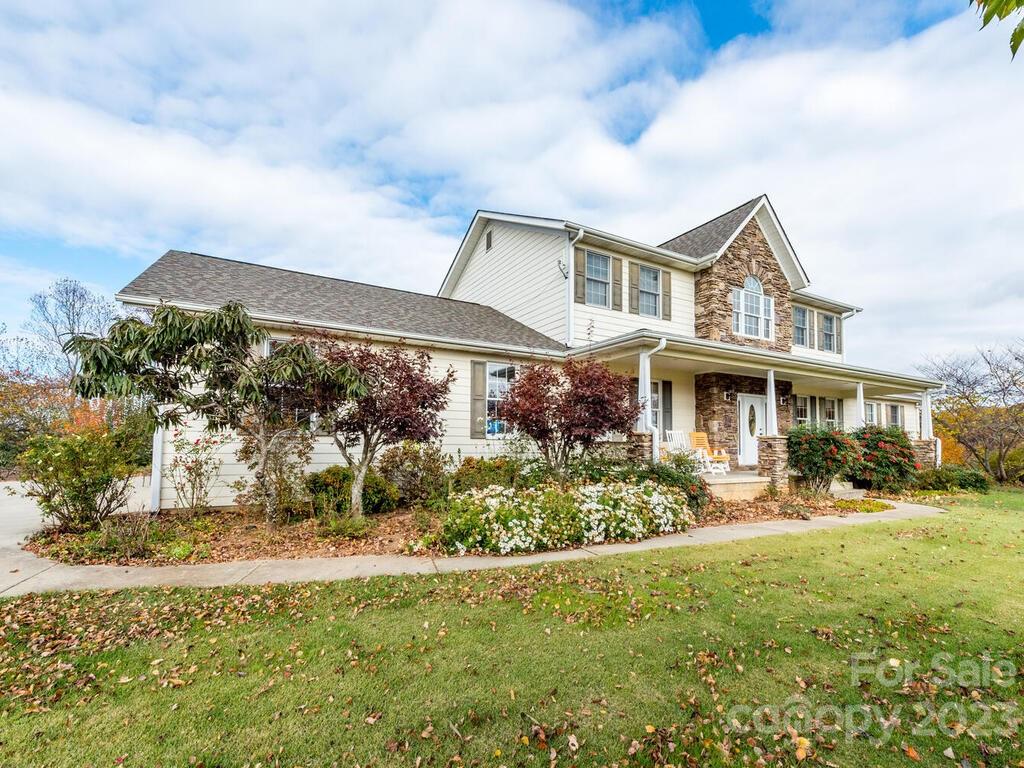 264 Hazel Brook Road Marshall, NC 28753 - Photo 3 of 47 a front view of house with yard