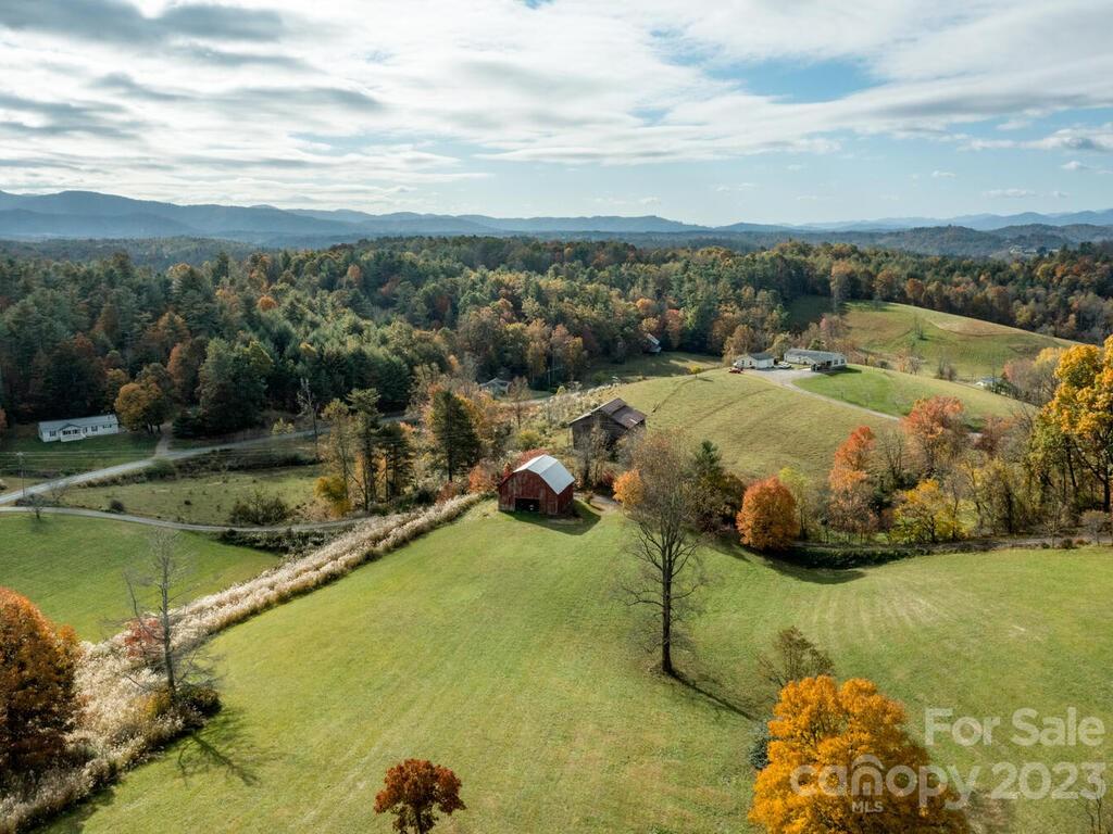 264 Hazel Brook Road Marshall, NC 28753 - Photo 40 of 47 a view of a lake with big yard