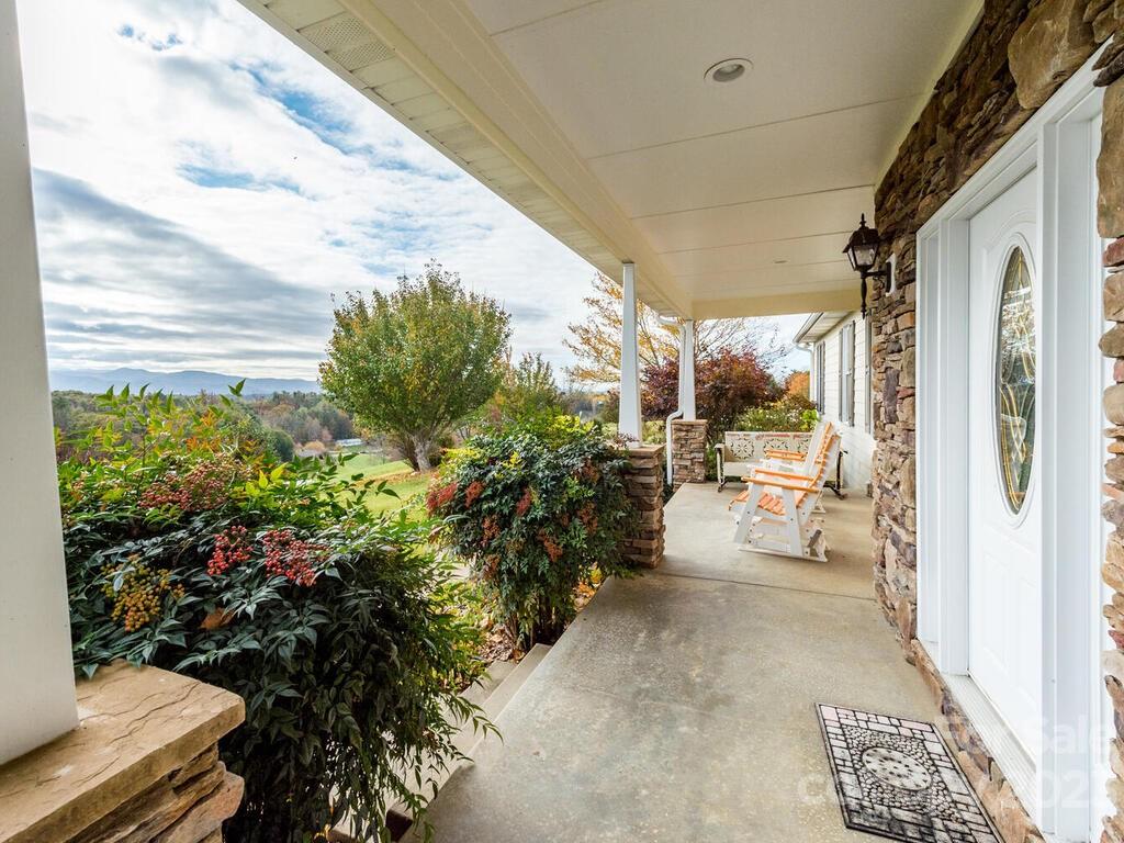 264 Hazel Brook Road Marshall, NC 28753 - Photo 4 of 47 a view of a back yard of the house
