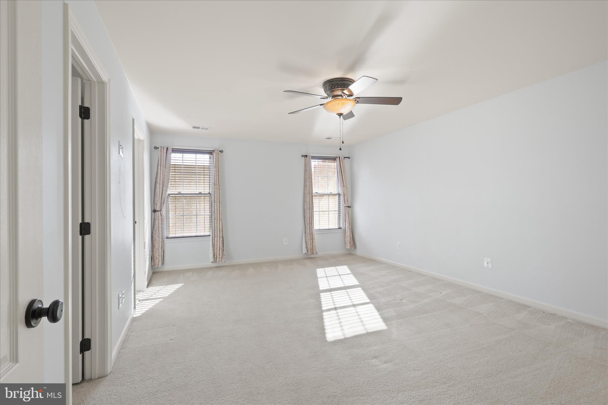 15221 Londons Bridge Road Haymarket, VA 20169 - Photo 12 of 43 wooden floor in an empty room with a window