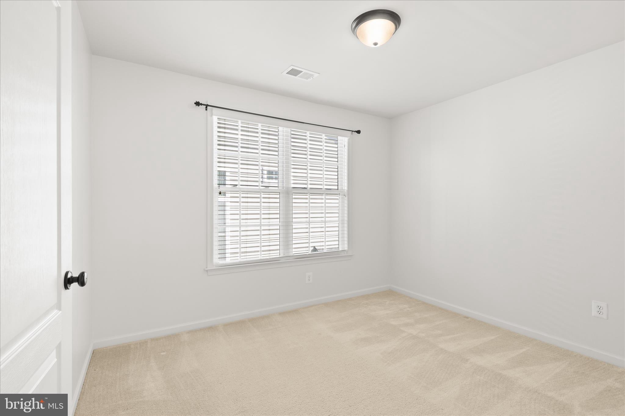 15221 Londons Bridge Road Haymarket, VA 20169 - Photo 16 of 43 an empty room with a window