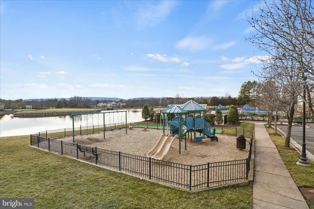 a view of a swimming pool and lake view
