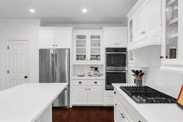 a bathroom with a bathtub and a sink