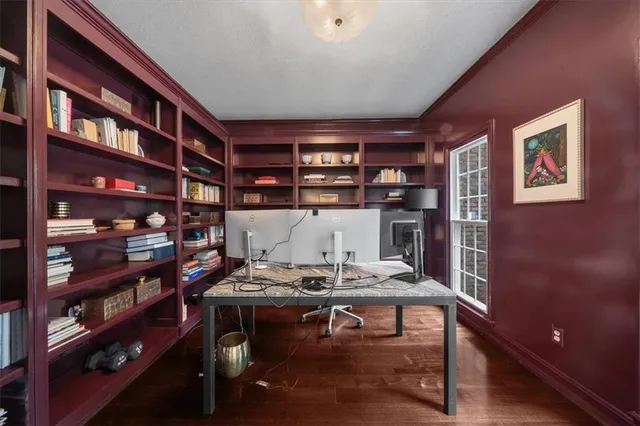 a view of a chairs on wooden deck