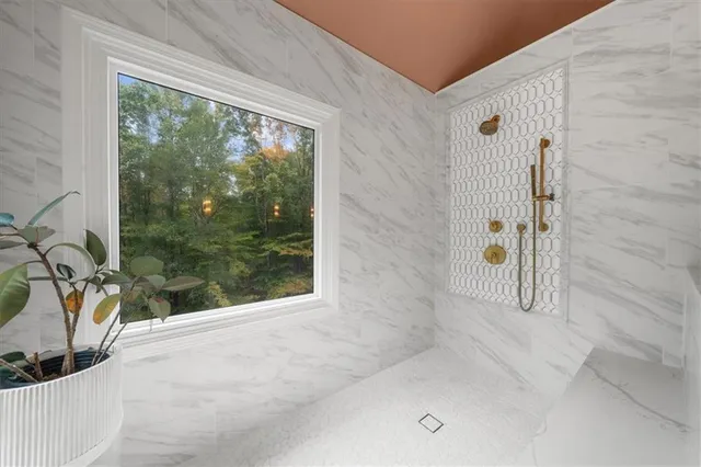 a view of a house with a yard and plants