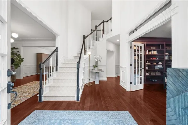 a kitchen with stainless steel appliances a sink stove and refrigerator