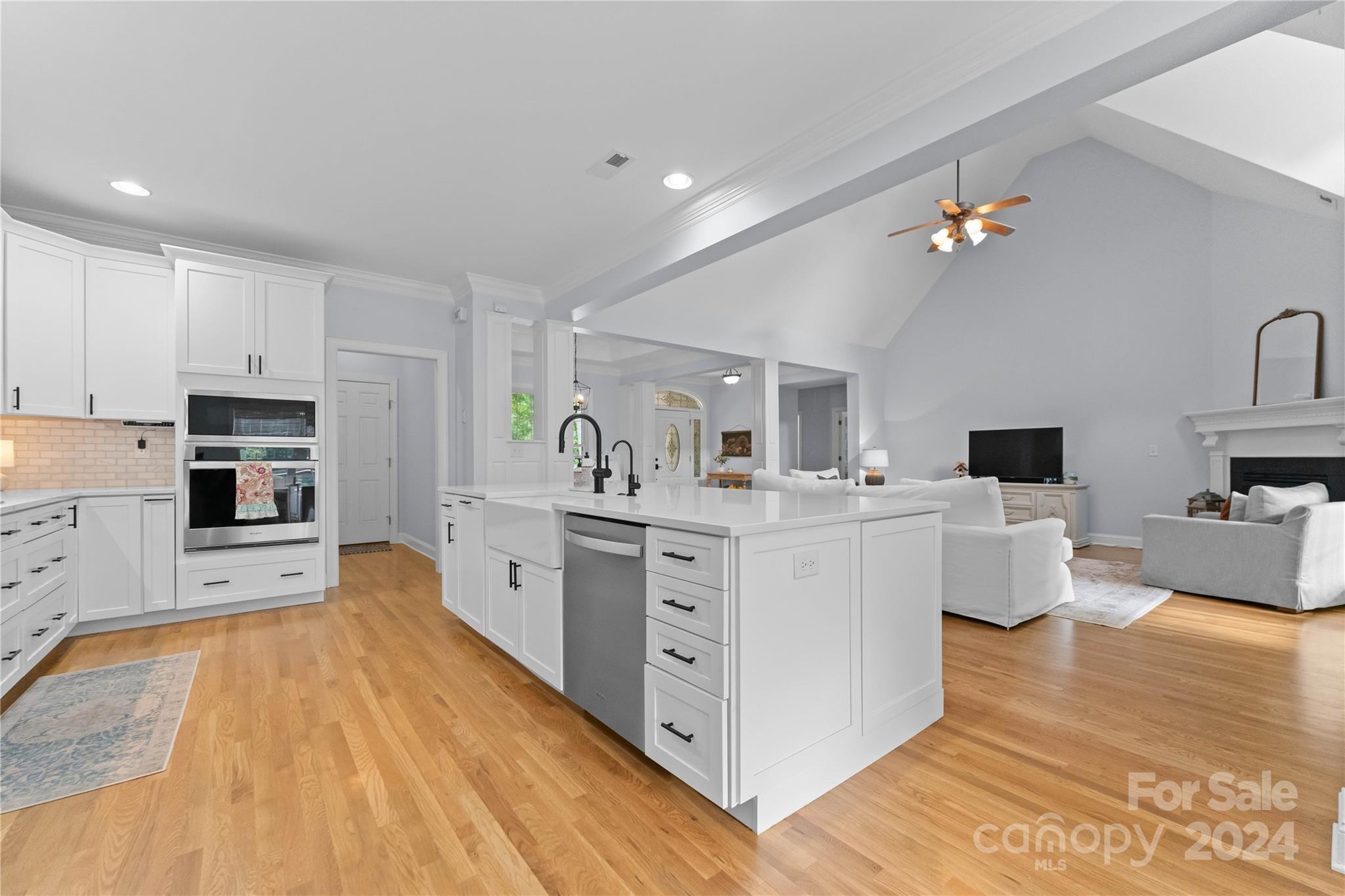 5888 Johnson Road Clover, SC 29710 - Photo 13 of 44 a large white kitchen with cabinets