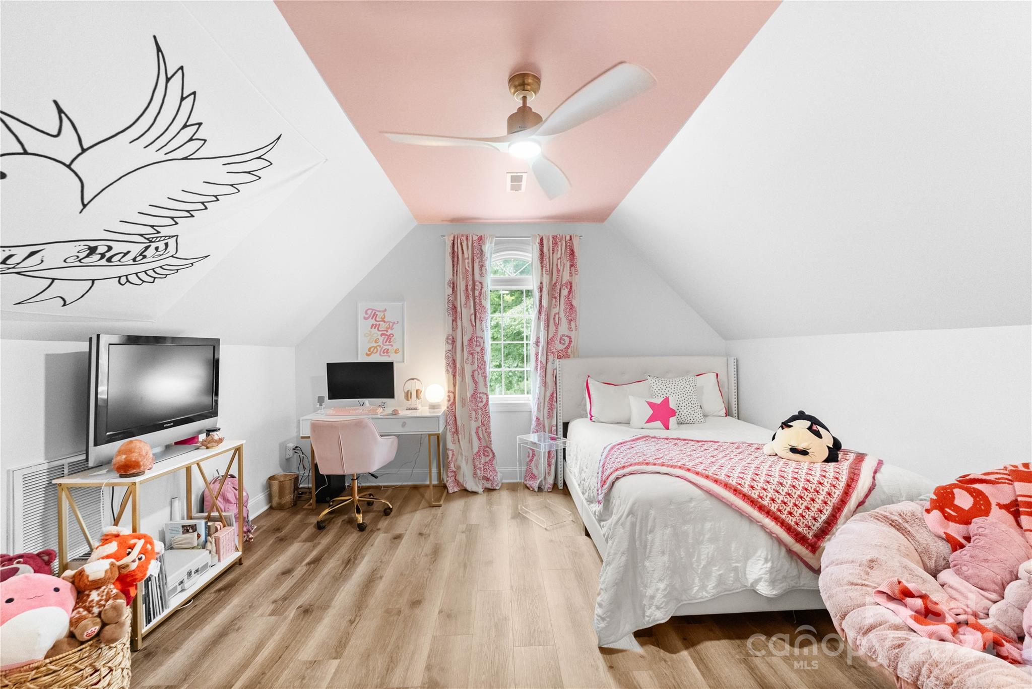 5888 Johnson Road Clover, SC 29710 - Photo 25 of 44 a bedroom with a bed and a flat screen tv