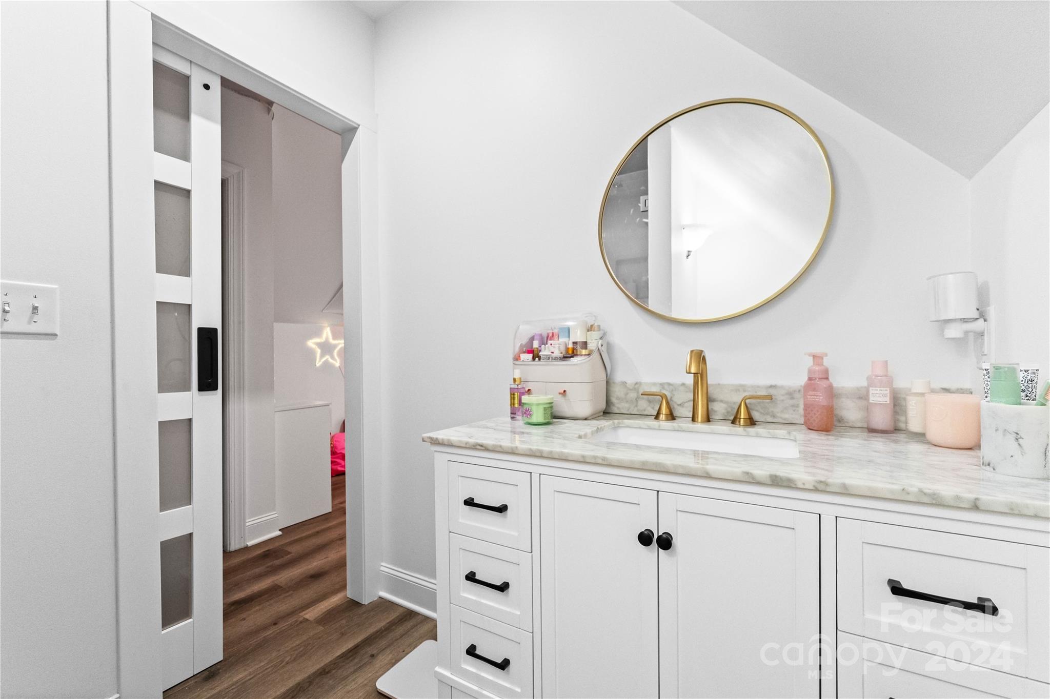5888 Johnson Road Clover, SC 29710 - Photo 27 of 44 a bathroom with a granite countertop sink and a mirror