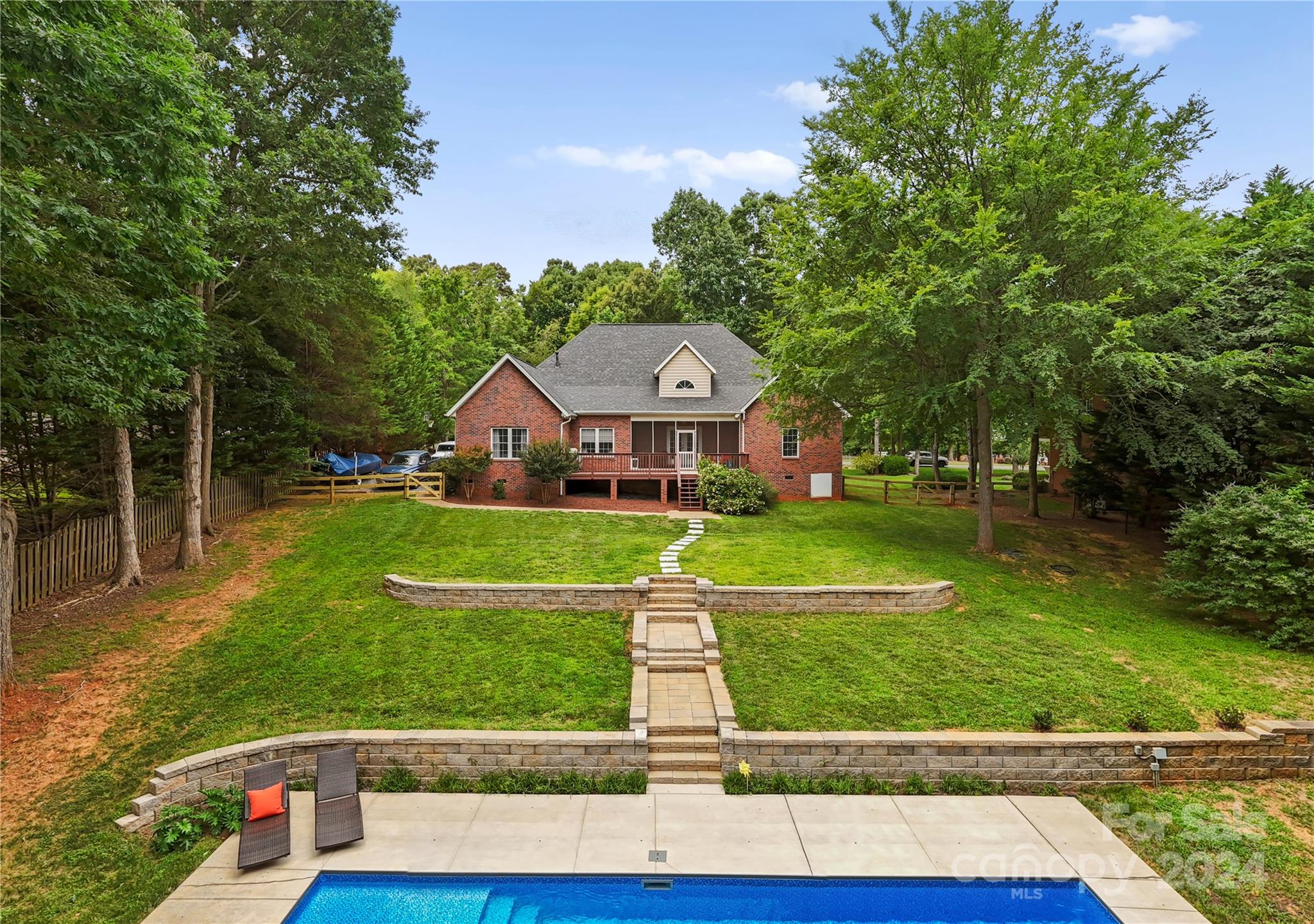 5888 Johnson Road Clover, SC 29710 - Photo 39 of 44 a view of a house with a big yard plants and large trees