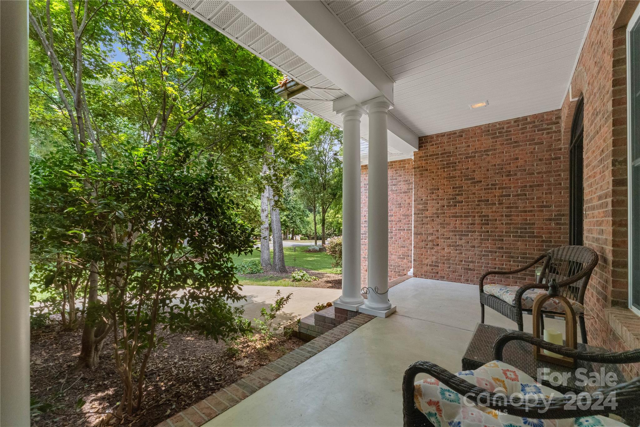 5888 Johnson Road Clover, SC 29710 - Photo 5 of 44 a living room with patio furniture and a potted plant