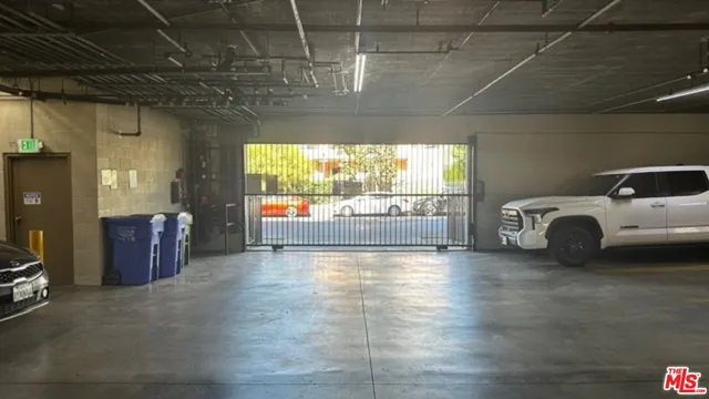 a balcony with furniture and wooden floor