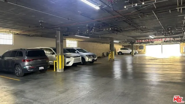 a car parked in front of white house