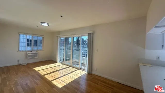 a kitchen with stainless steel appliances a sink and a stove