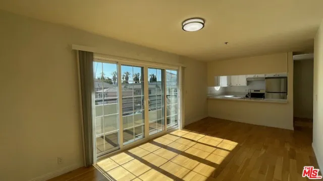 a kitchen with a stove and a microwave