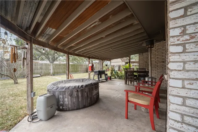 a living room with furniture a table and chairs