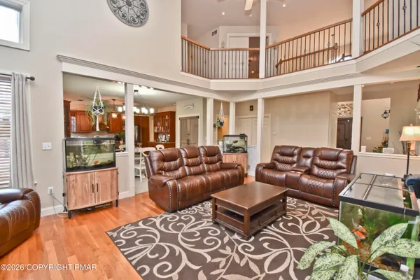 a bathroom with a toilet a sink and a mirror