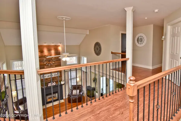 a bed room with a bed and a chandelier