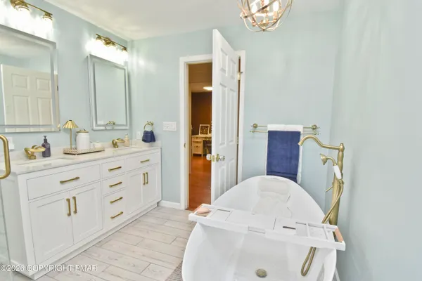 a view of swimming pool with an outdoor space and seating