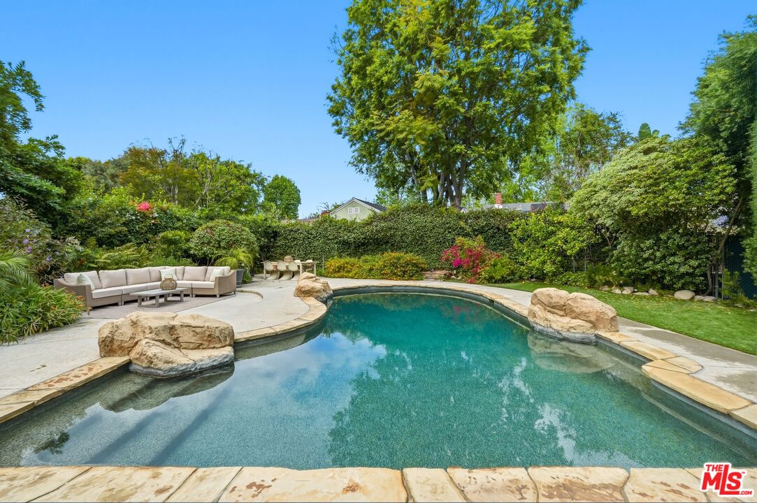 13019 Addison Street Sherman Oaks, CA 91423 - Photo 23 of 28 a view of swimming pool from a yard